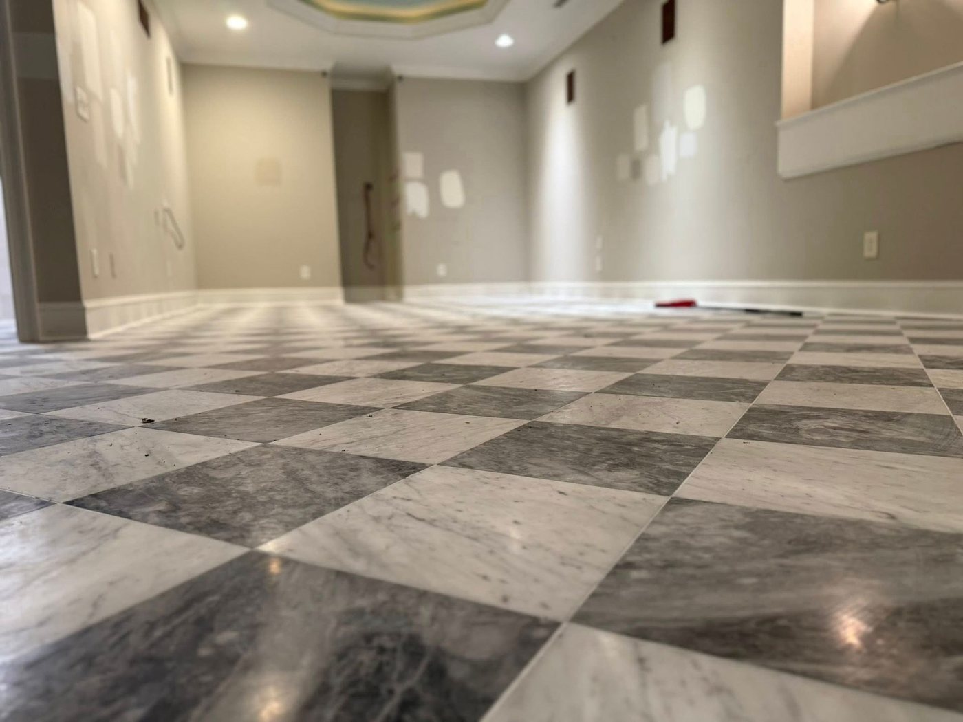 Checkered marble floor installation