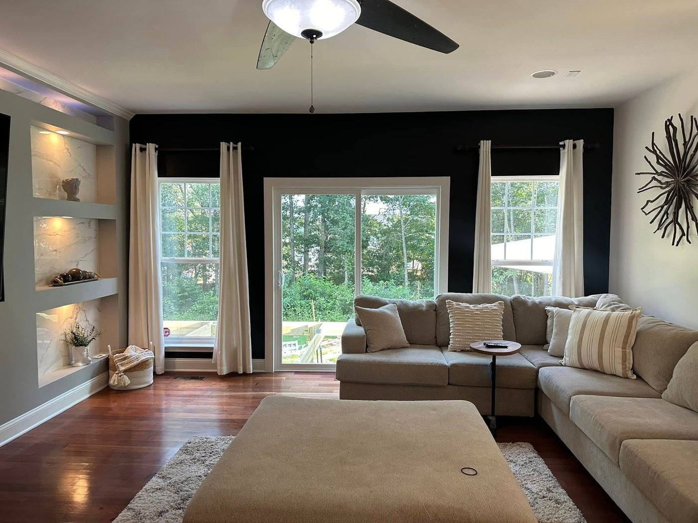 Living room with custom floating shelves